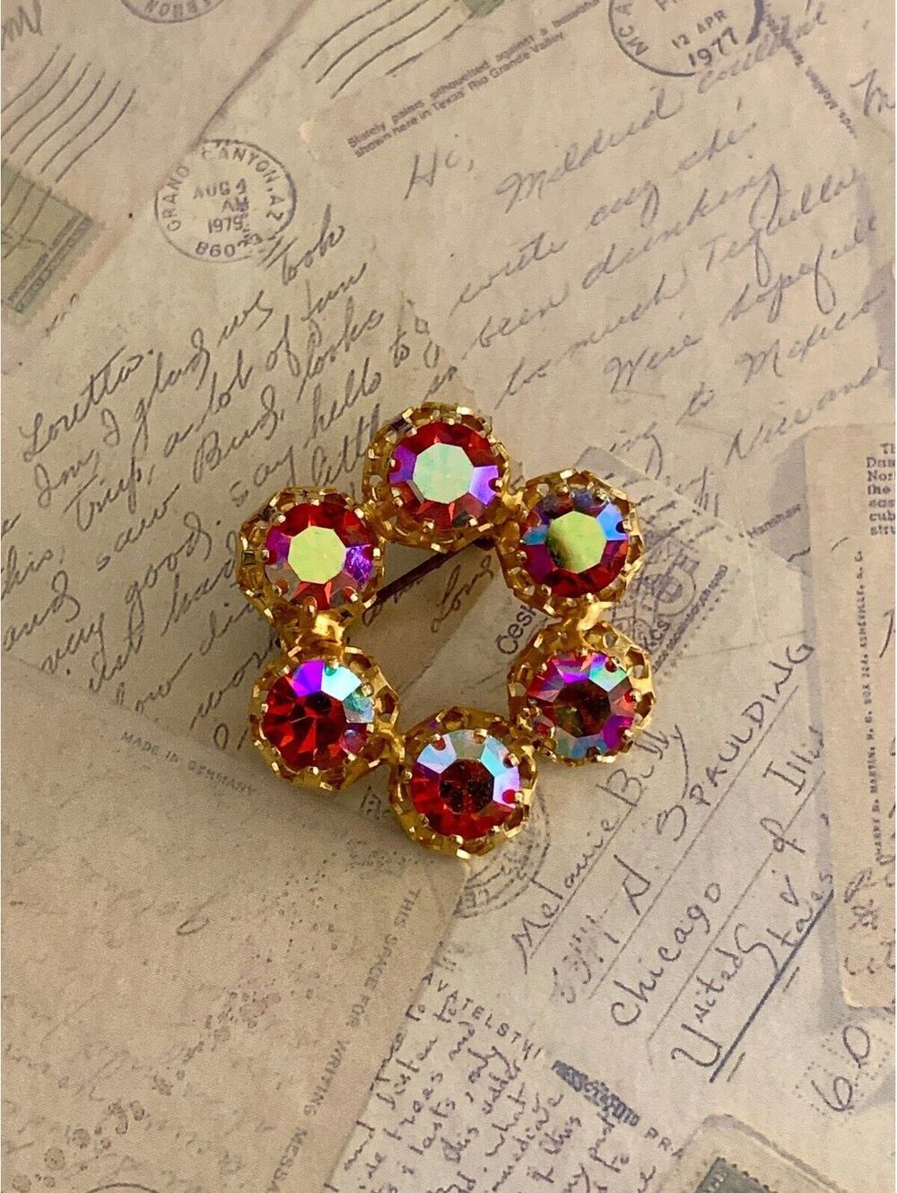 Vintage Dazzling Circle Pin with Sparkling Red Aurora Borealis Crystals